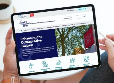 JRO website shown on an iPad screen