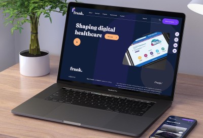 Frank new website shown on a laptop screen