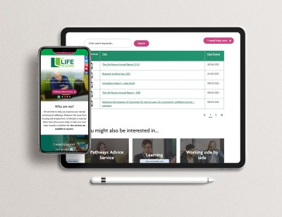 The Life Rooms website shown on screen